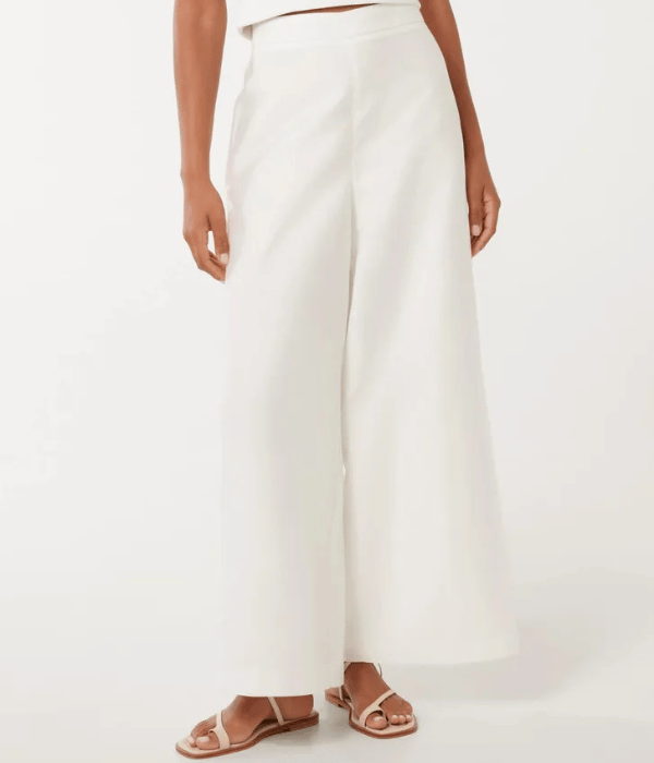 image of a woman wearing wide white colour pants