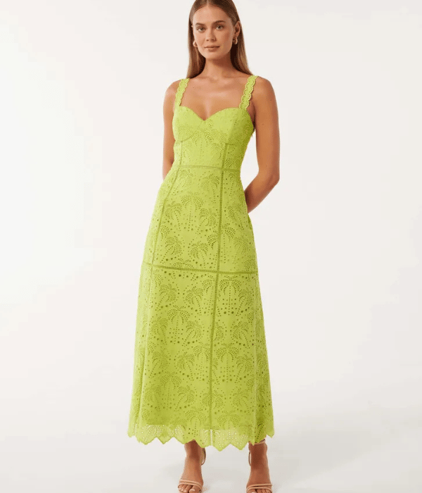 model wearing a green dress