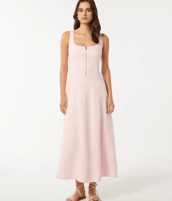 model wearing pink aline dress with zip in the front
