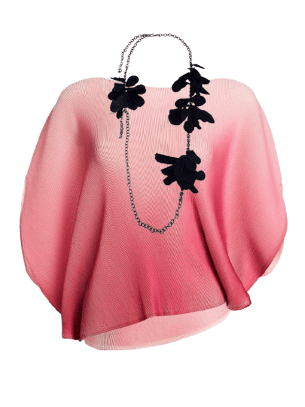 pink boatneck sweater with black floral necklace