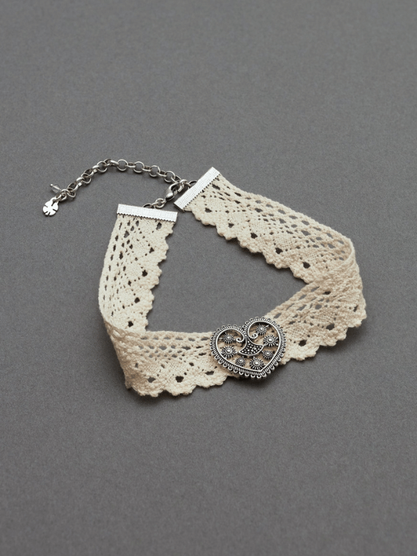 cream lace choker with a heart pendant with small pearls