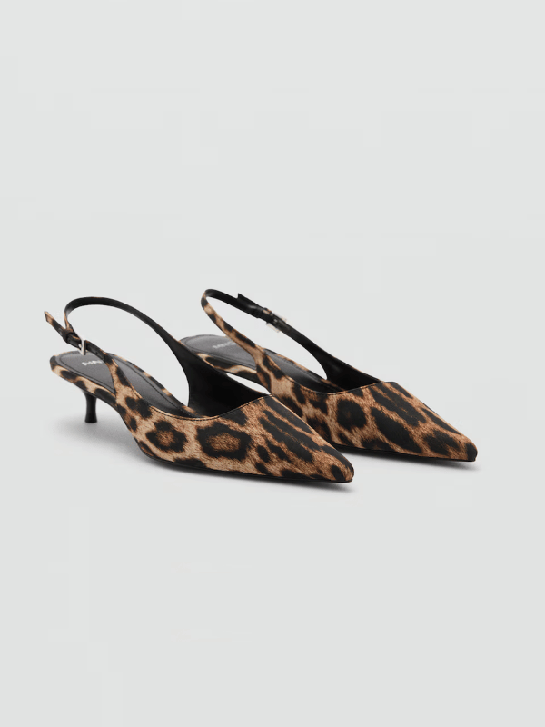 animal print shoes on grey background