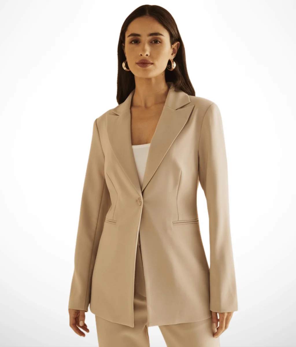 beige one button jacket with matching pants and white top